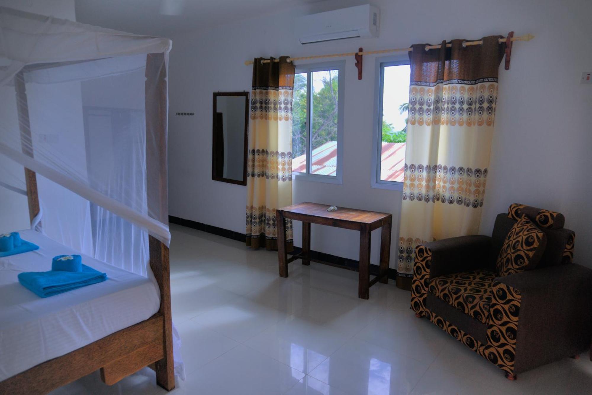 Cocolala Beach House Nungwi Habitación foto